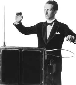 Leon Theremin playing one.
